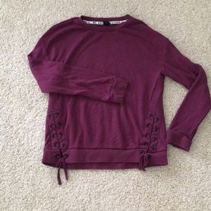 Sweater with lace up detail